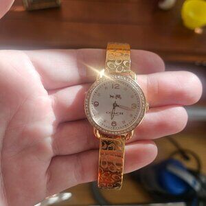 Rose gold coach watch